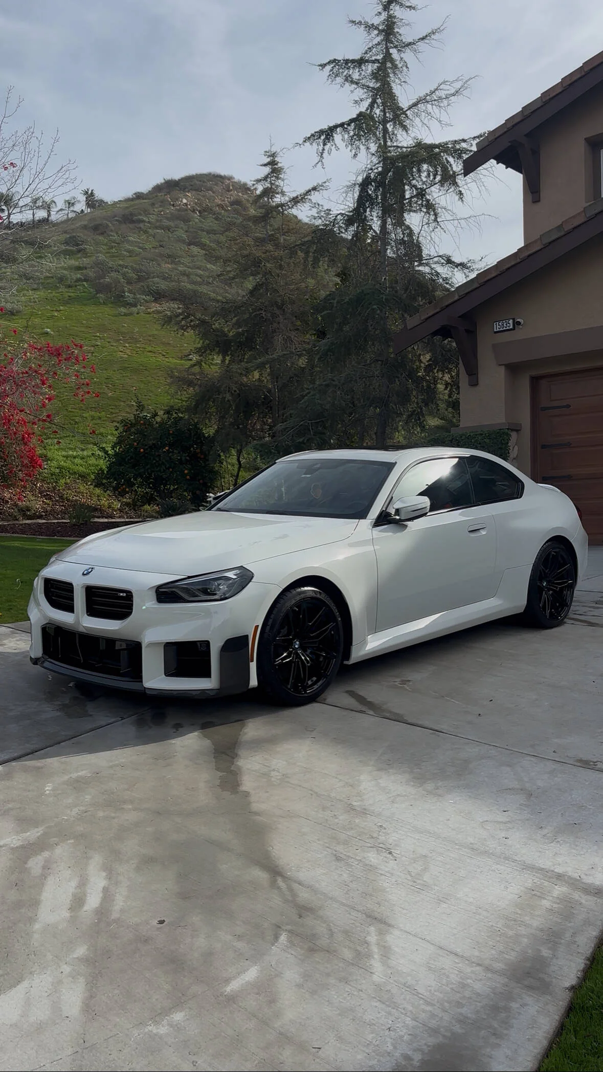Clean white BMW M2 after professional mobile detailing service in Bryan TX